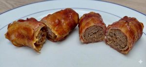 Shotgun-SHells sind gefüllte >Cannelloni mit Bacon-Ummantelung und Glasur.
